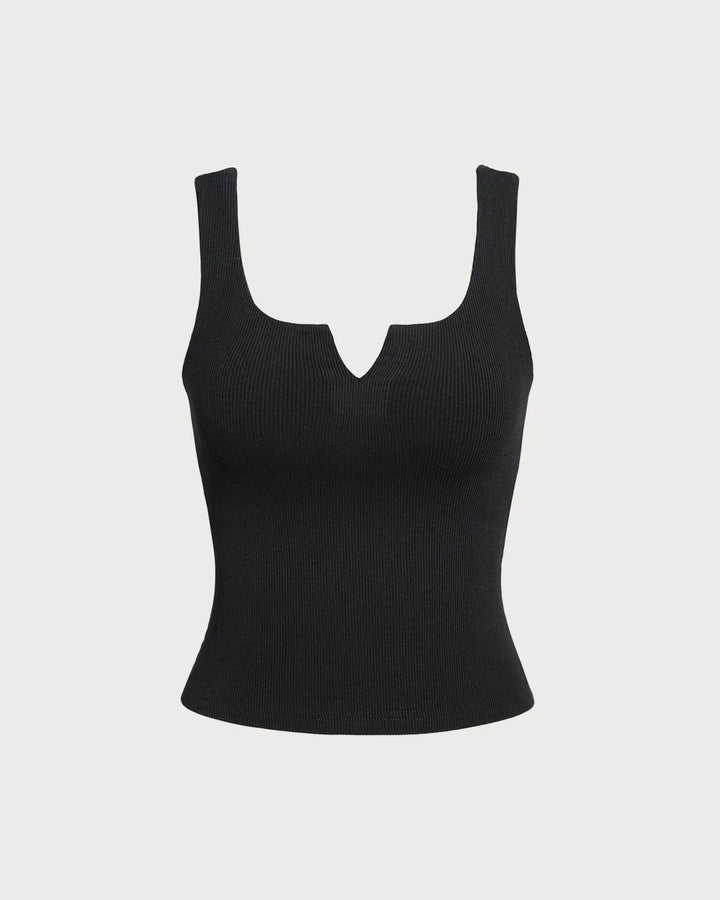 Black sweetheart neck bodysuit on model, alternate angle showing overall fit and form