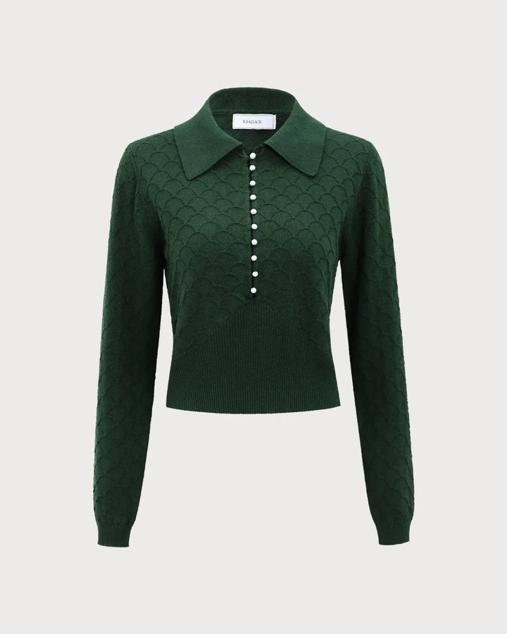 Dark green pearl button polo knit top on standing model