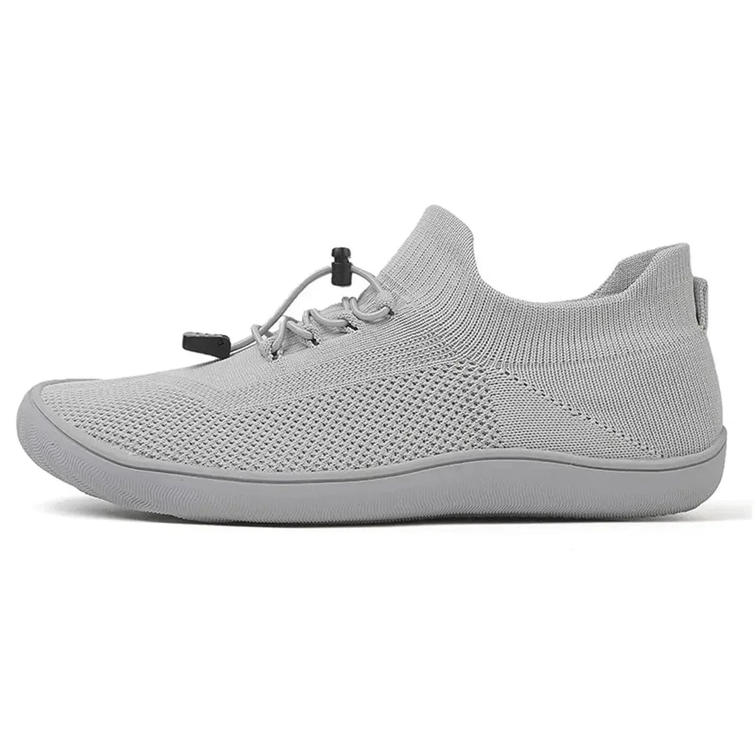 Gray barefoot knit sneaker, side profile view