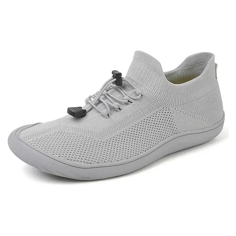 Gray barefoot knit sneaker, three-quarter angle view