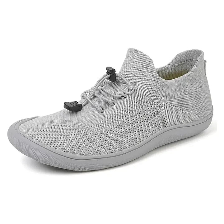Gray barefoot knit sneaker, three-quarter angle view