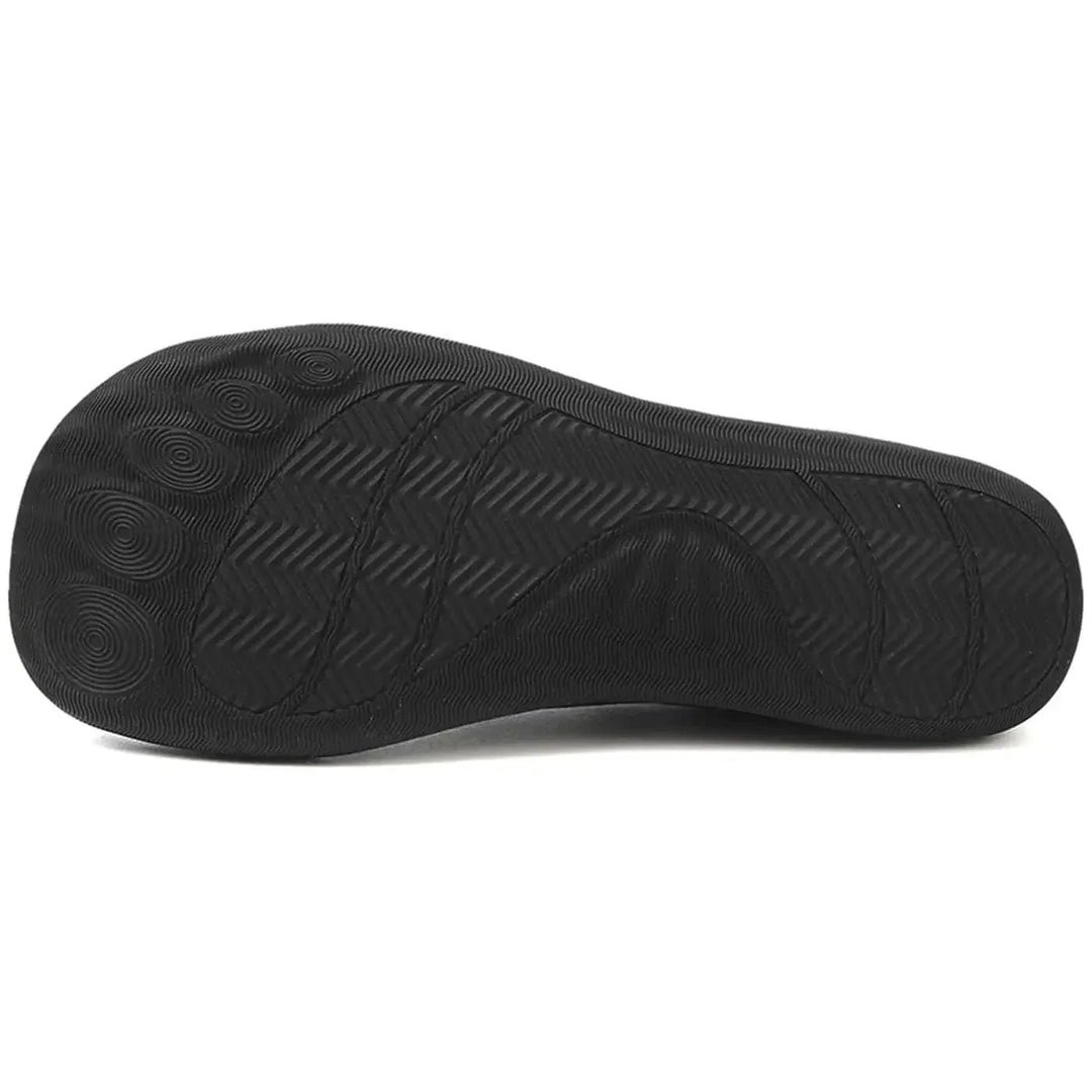 Gray barefoot knit sneaker, on-foot three-quarter view