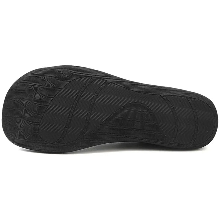 Gray barefoot knit sneaker, on-foot three-quarter view