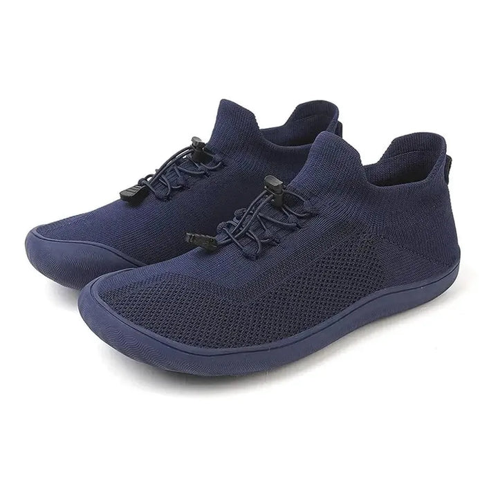 Gray barefoot knit sneaker, angled overhead view