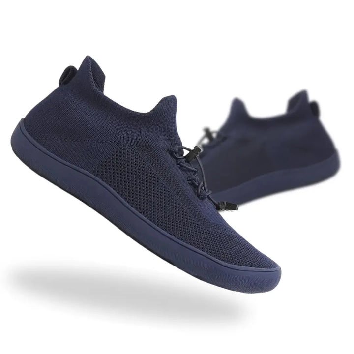 Navy blue barefoot knit sneaker, side profile view