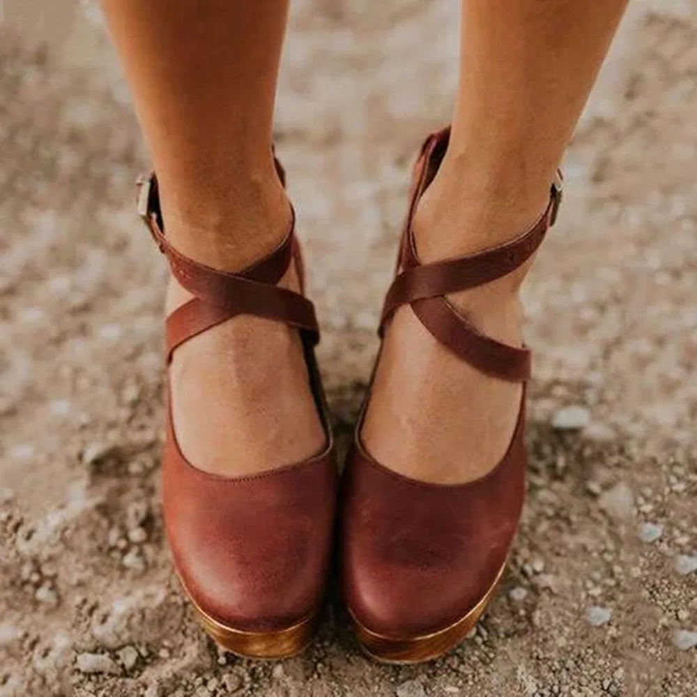 Brown cross strap clog heel with chunky sole, front view