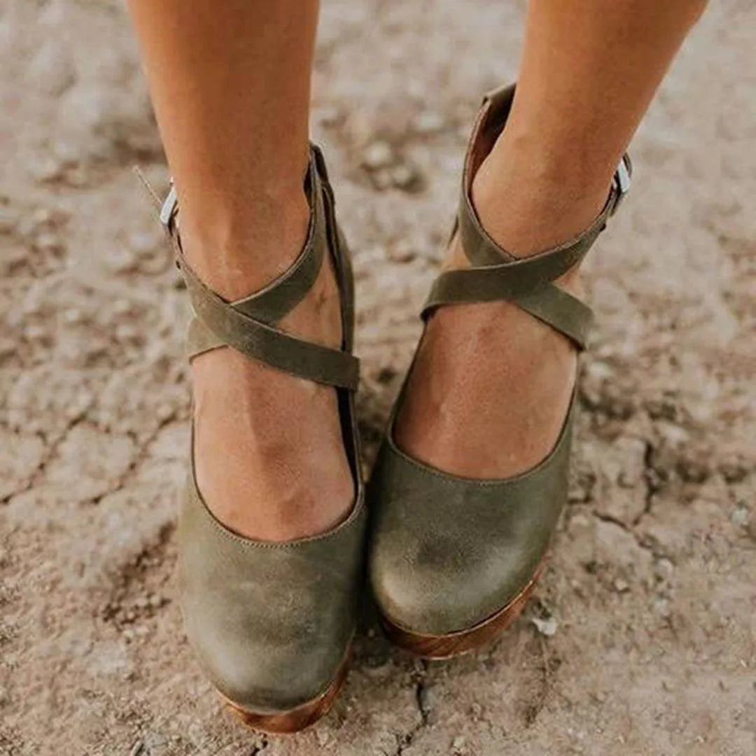 Green cross strap clog heel with chunky sole, front view