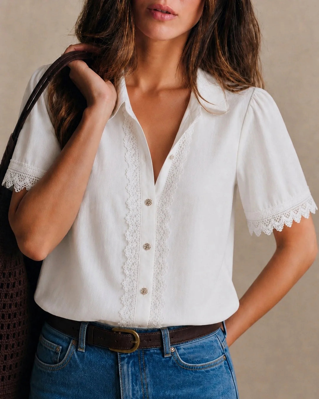 White lace trim blouse on model facing forward
