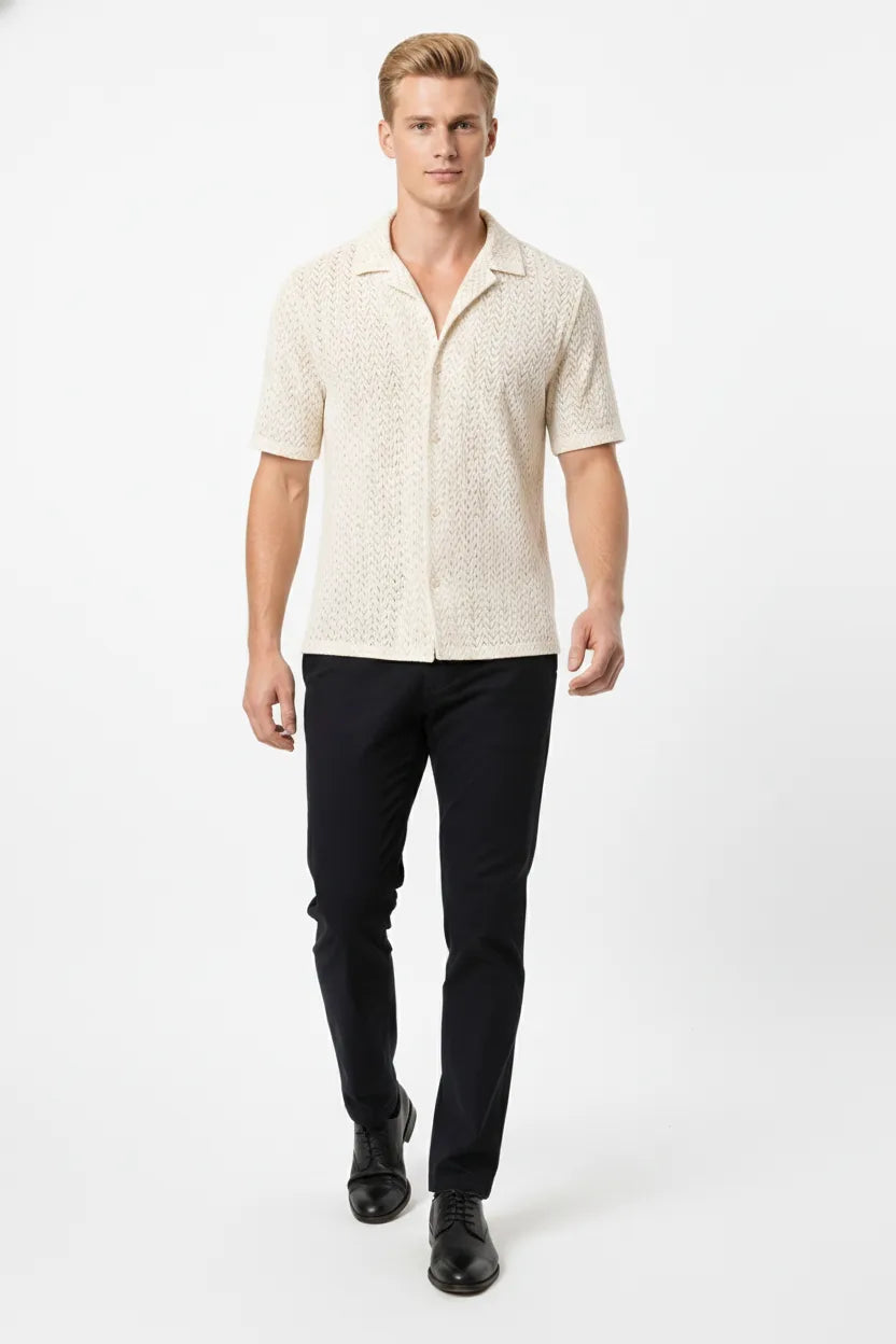 Beige chevron knit camp shirt on model in natural movement