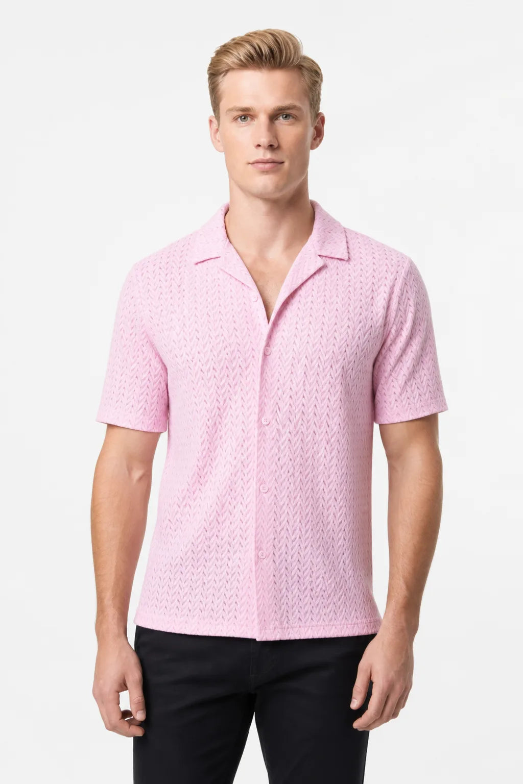 Pink chevron knit camp shirt on model in contrapposto stance