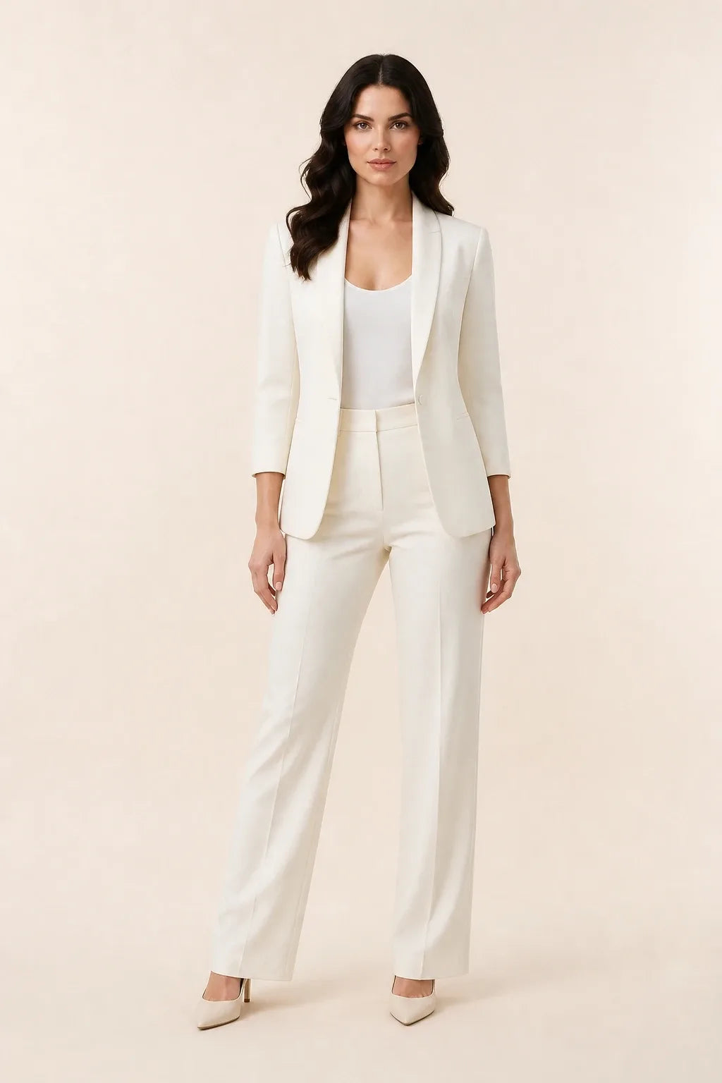 White open-front blazer with notch lapels worn by a model in a contrapposto stance