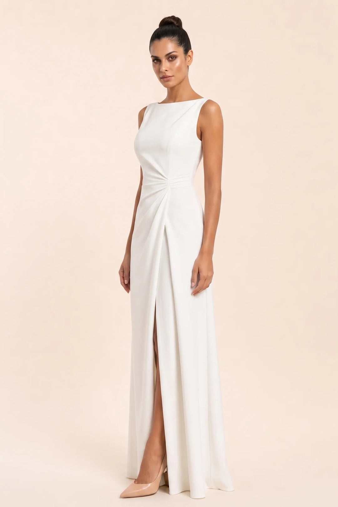White ruched sleeveless gown with thigh-high slit, model in three-quarter turn