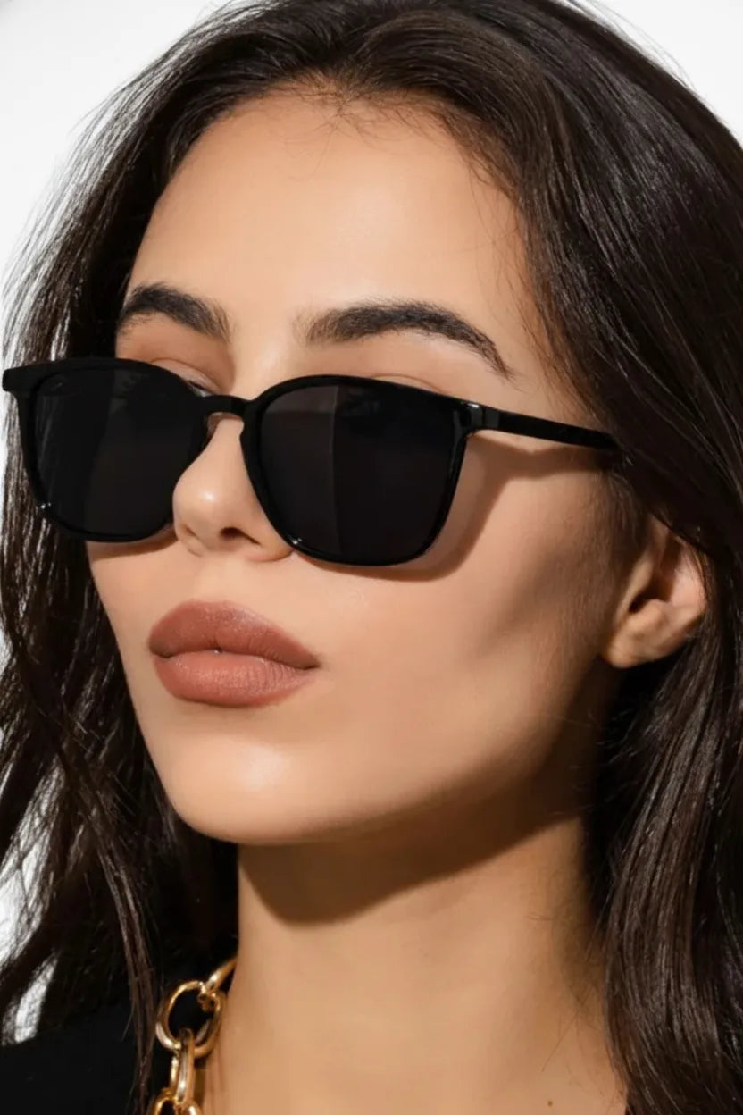 Black square acetate UV400 sunglasses displayed flat on a white background