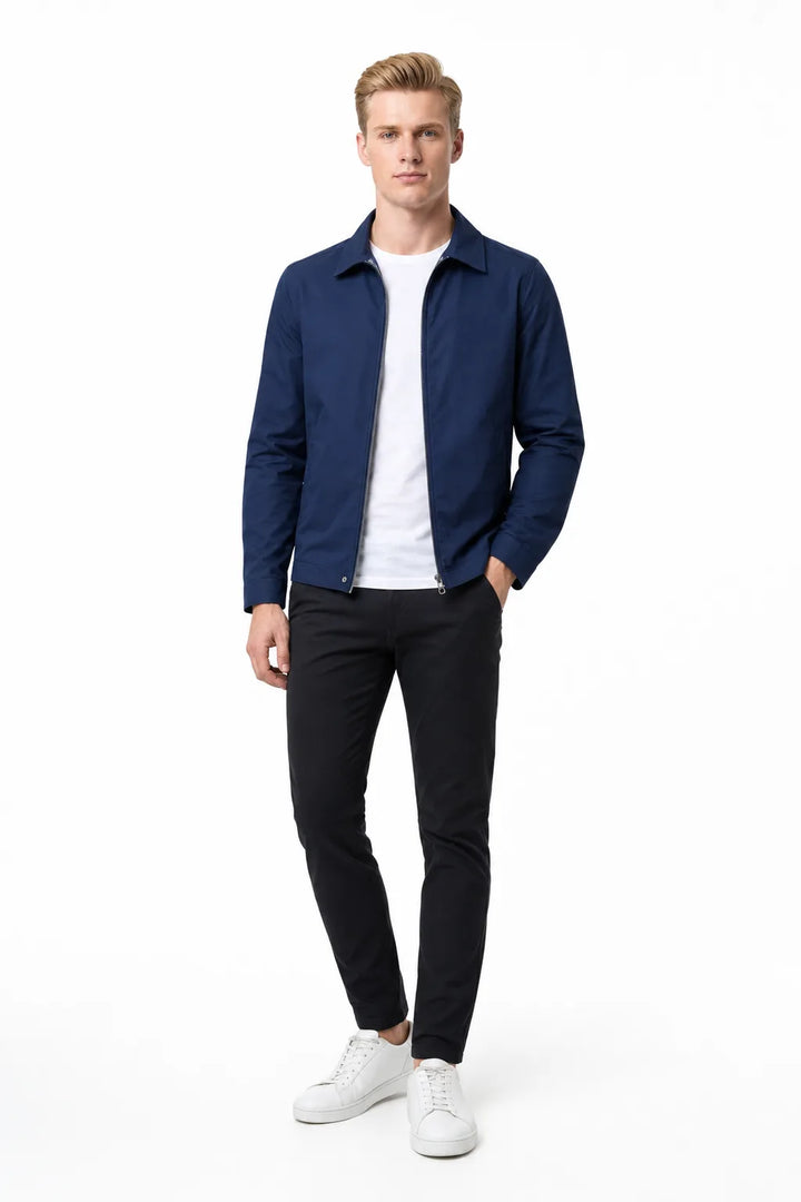 Blue gingham-lined harrington jacket on a standing model in contrapposto stance