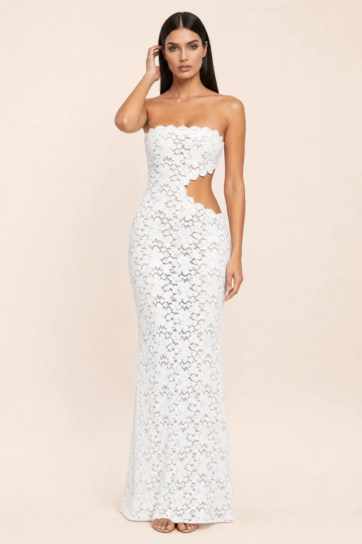 White lace cut-out gown on model in contrapposto stance