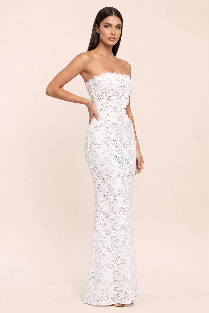 White lace cut-out gown on model in three-quarter turn