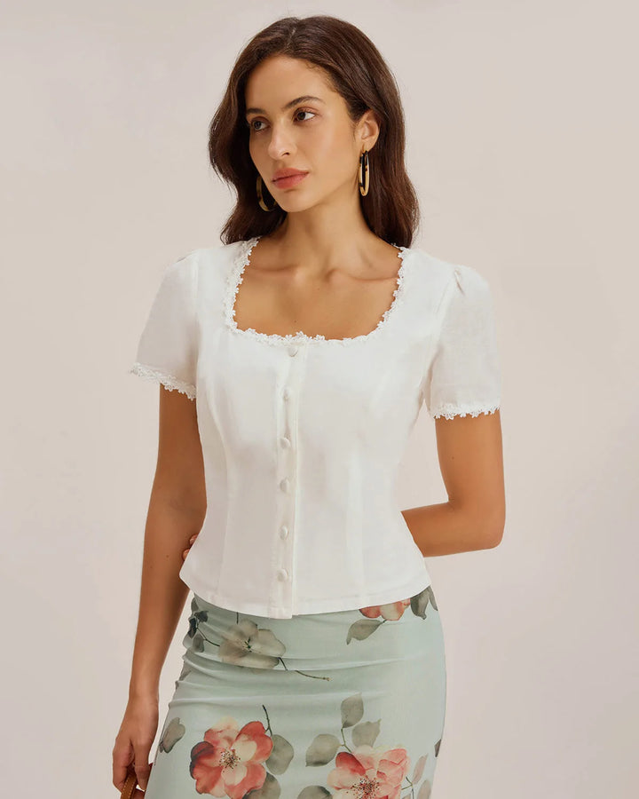 White lace trim button blouse, model at three-quarter turn