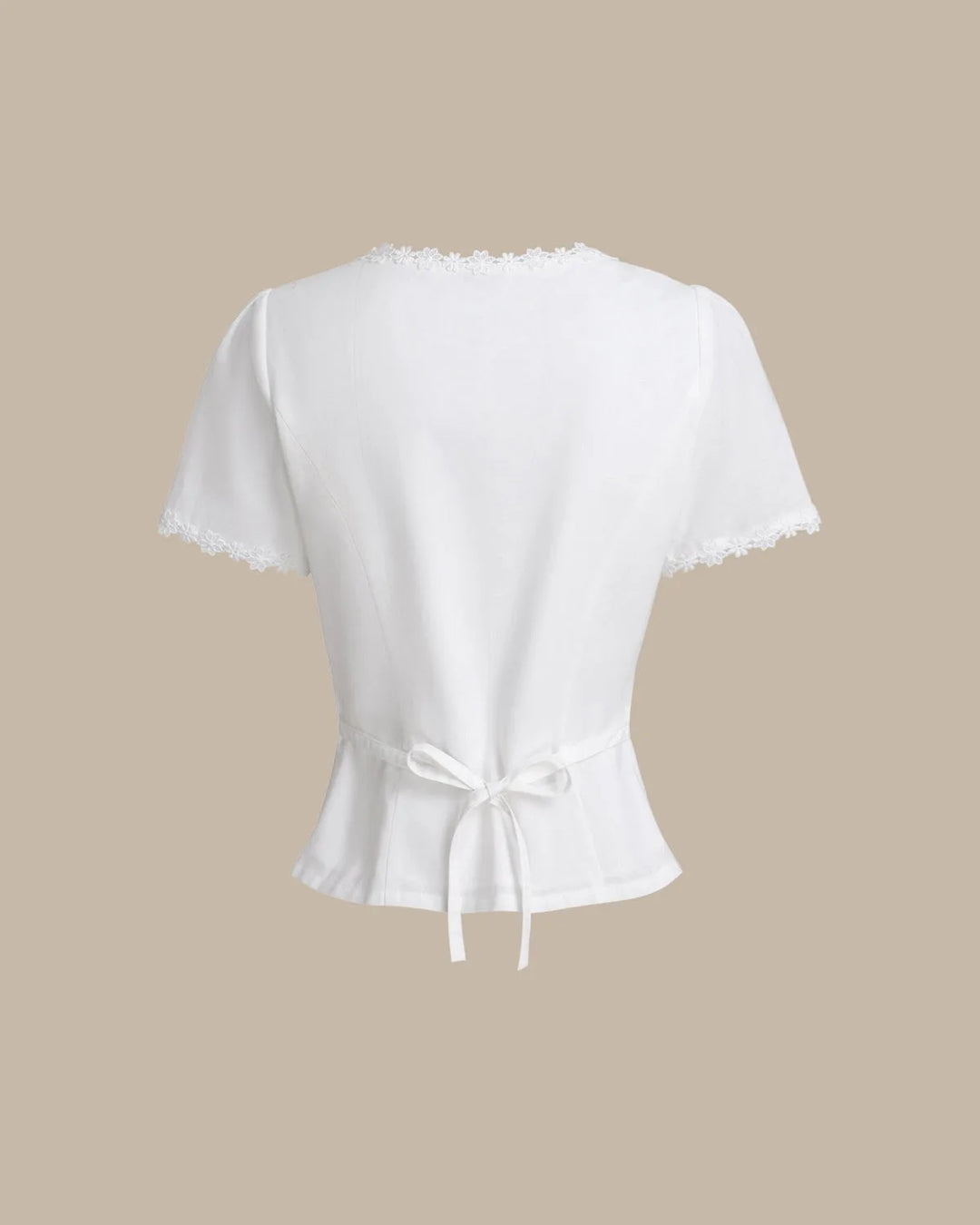 White lace trim button blouse, model in alternative standing pose
