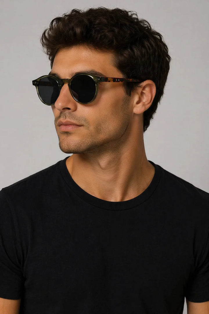 Round green acetate retro sunglasses shown from the front