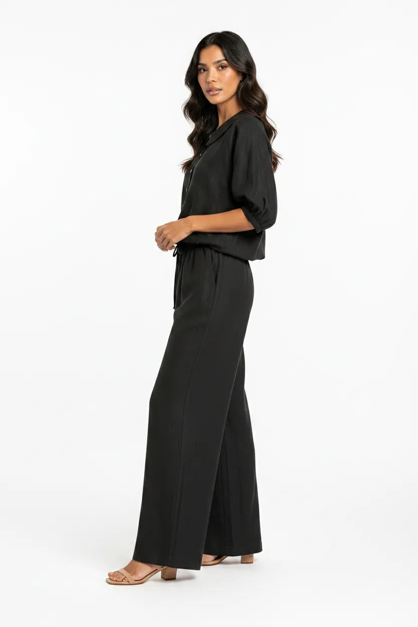 Black peter pan collar matching set on model in three-quarter turn