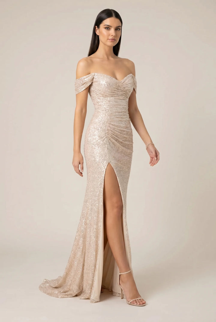 Champagne sequin ruched gown on a model in a three-quarter turn