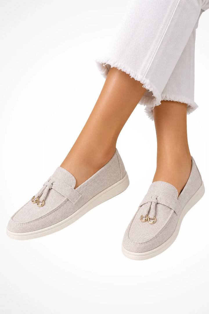 Beige tassel detail loafer, front view
