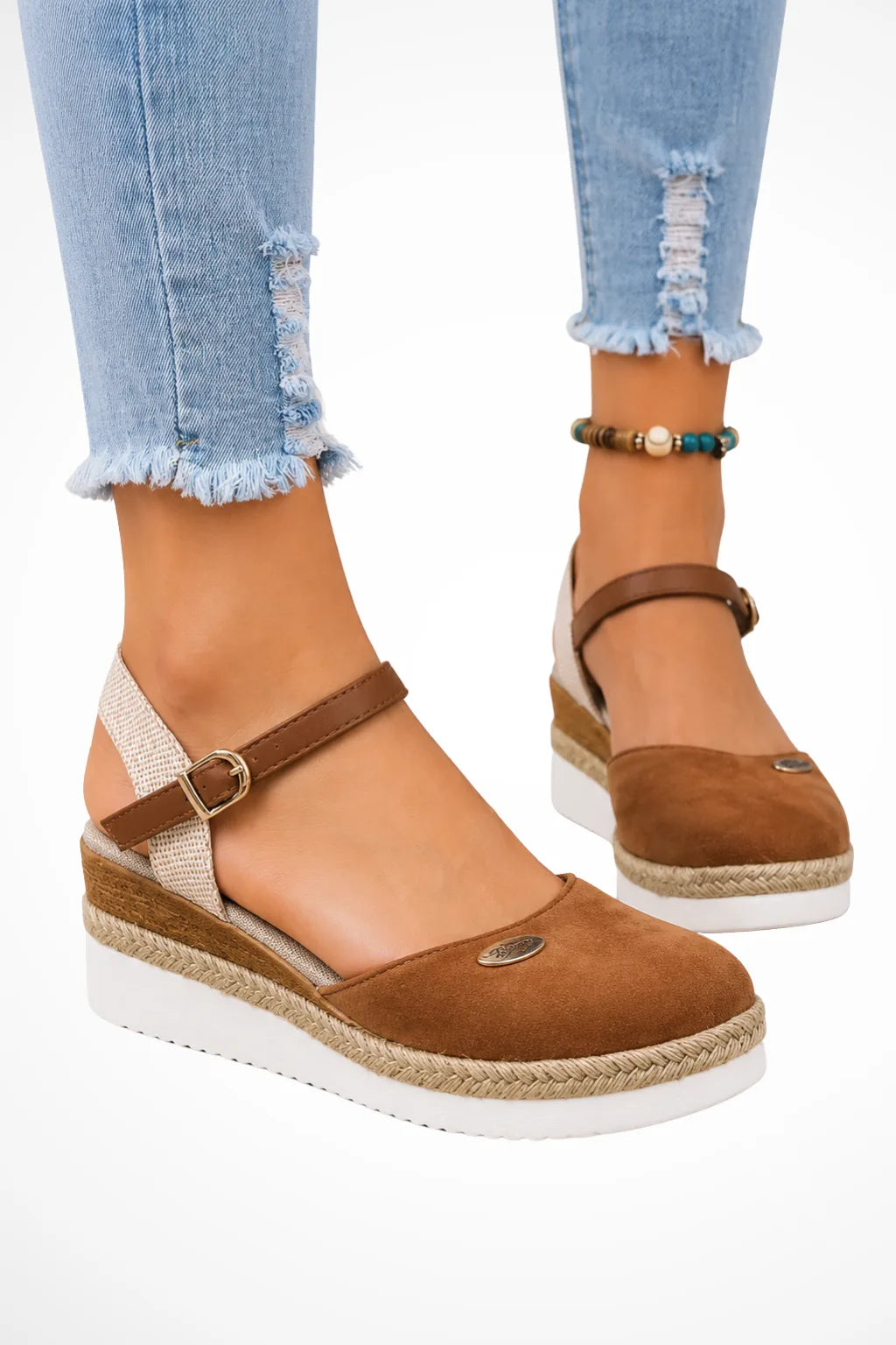 Brown espadrille wedge sandal with ankle strap, front view
