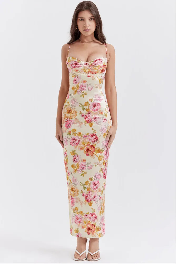Close-up detail of pink floral satin fabric and dress construction