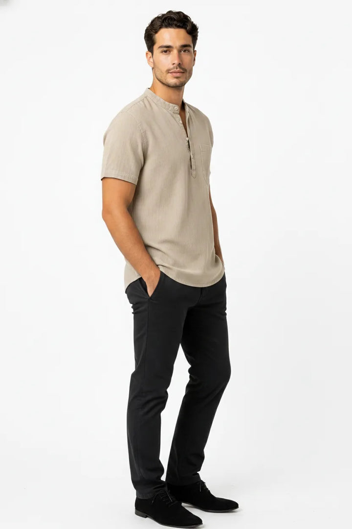 Khaki linen henley popover shirt on male model in three-quarter turn