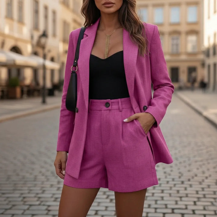 Model wearing a pink oversized double-breasted blazer