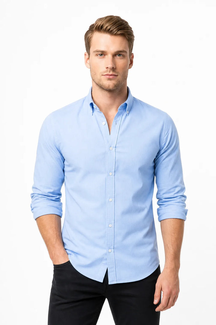 Medium blue slim linen shirt on male model in contrapposto stance