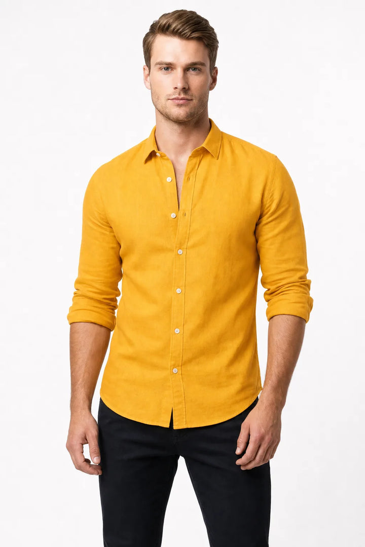 Yellow slim linen shirt on male model in contrapposto stance