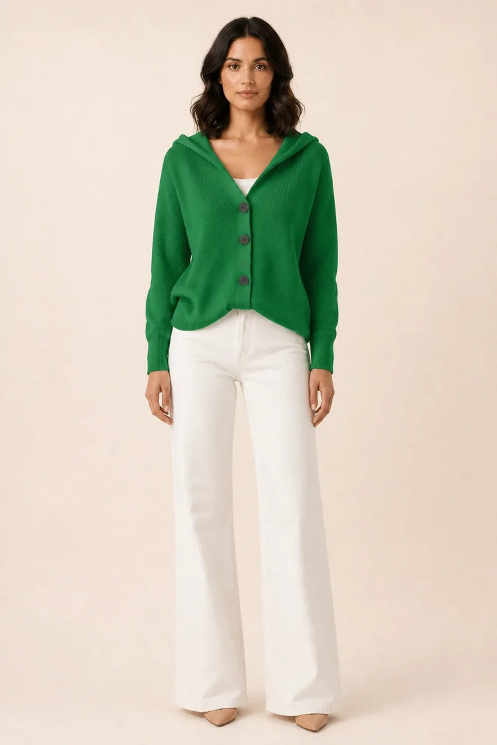 Dark green hooded button cardigan on a model in a contrapposto stance