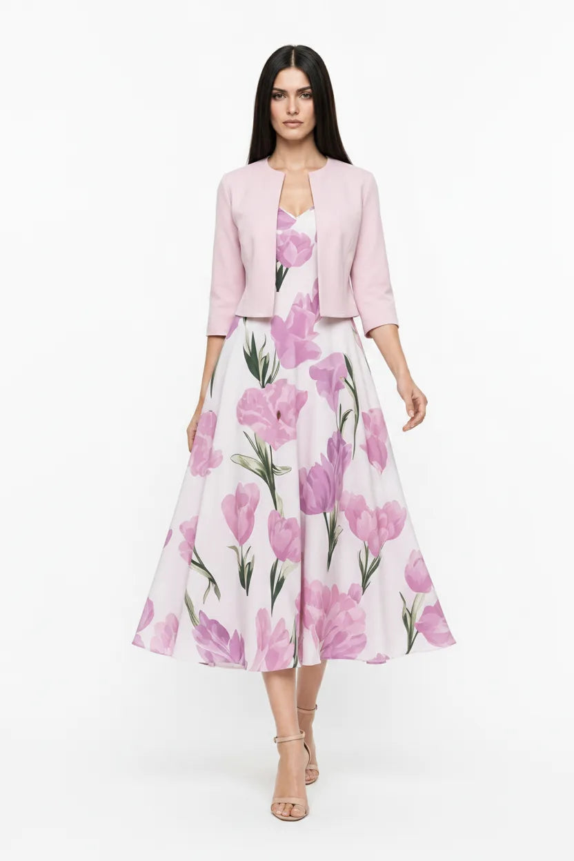Pink floral midi dress set on model in natural movement