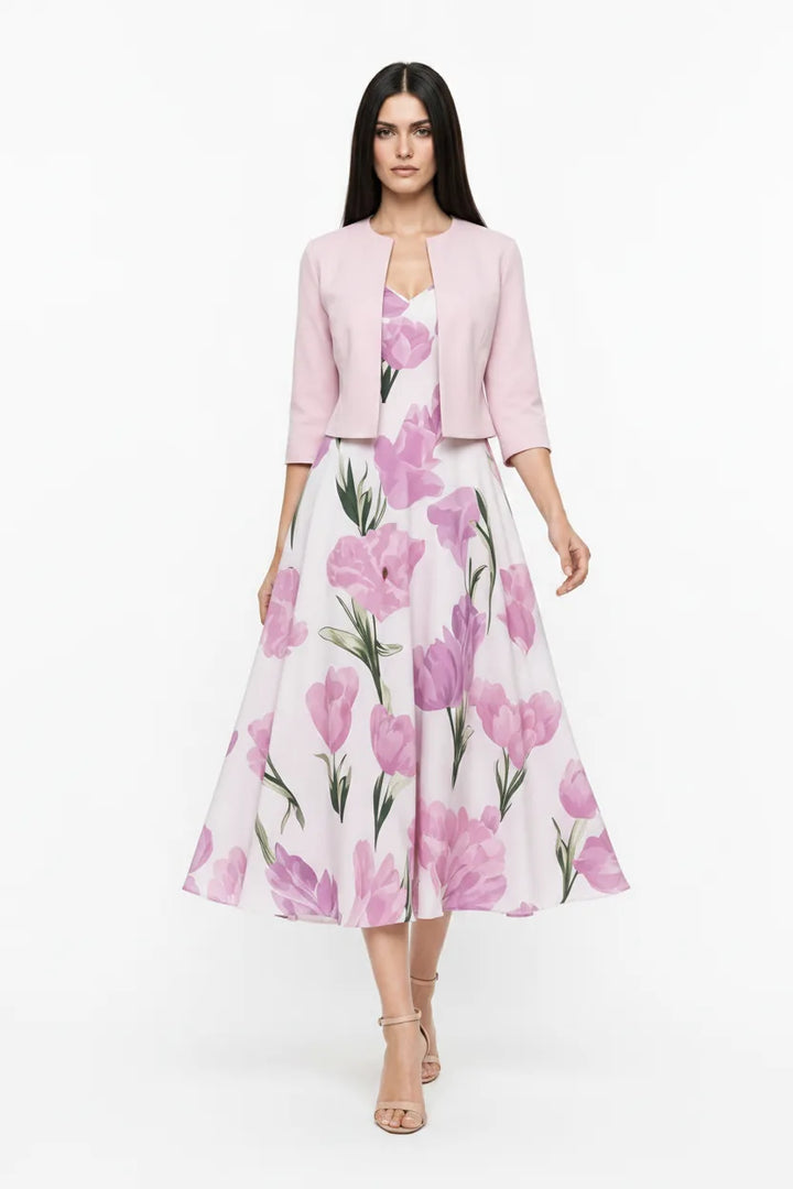 Pink floral midi dress set on model in natural movement