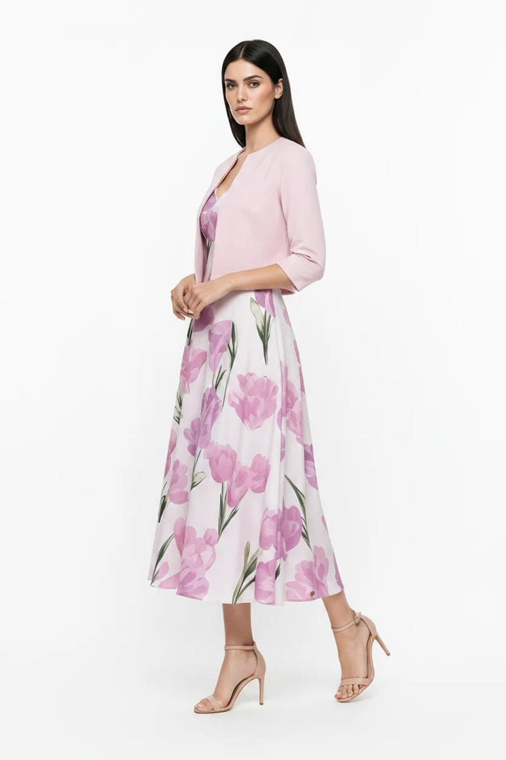 Pink floral midi dress set on model in three-quarter turn