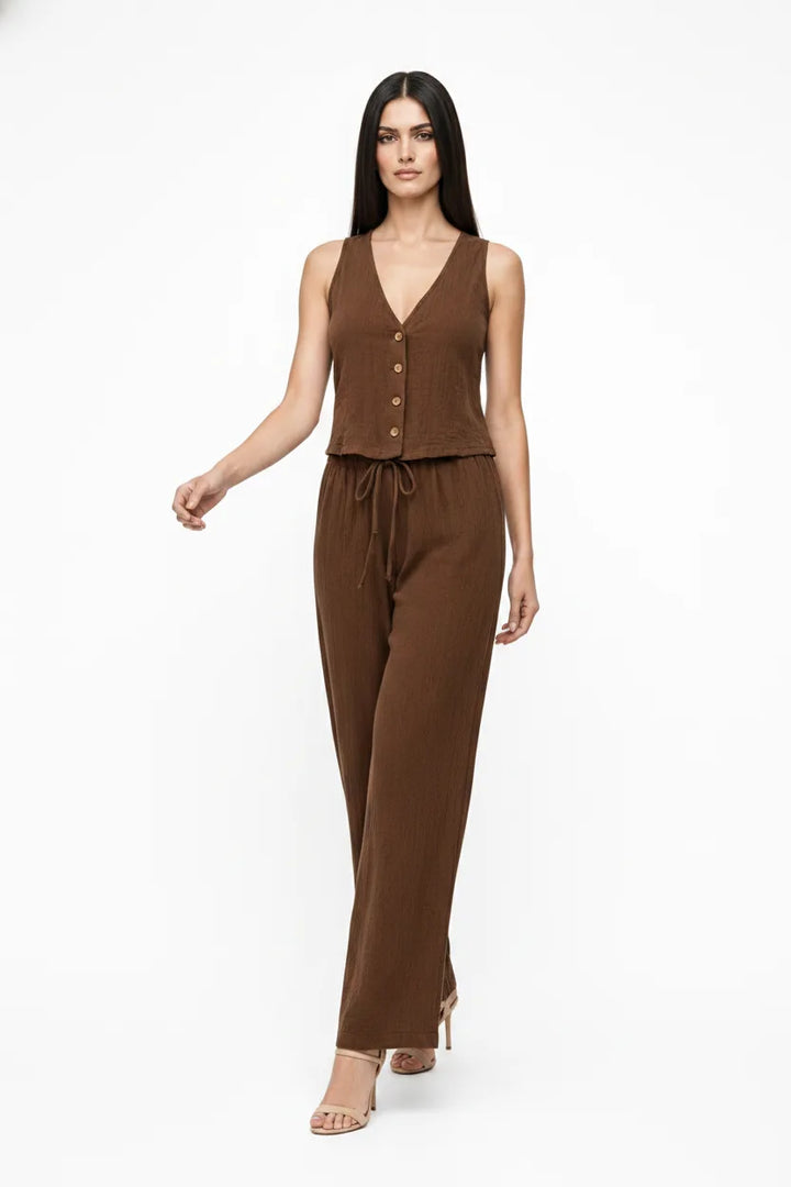 Brown button-front vest and matching trousers on a model in natural movement