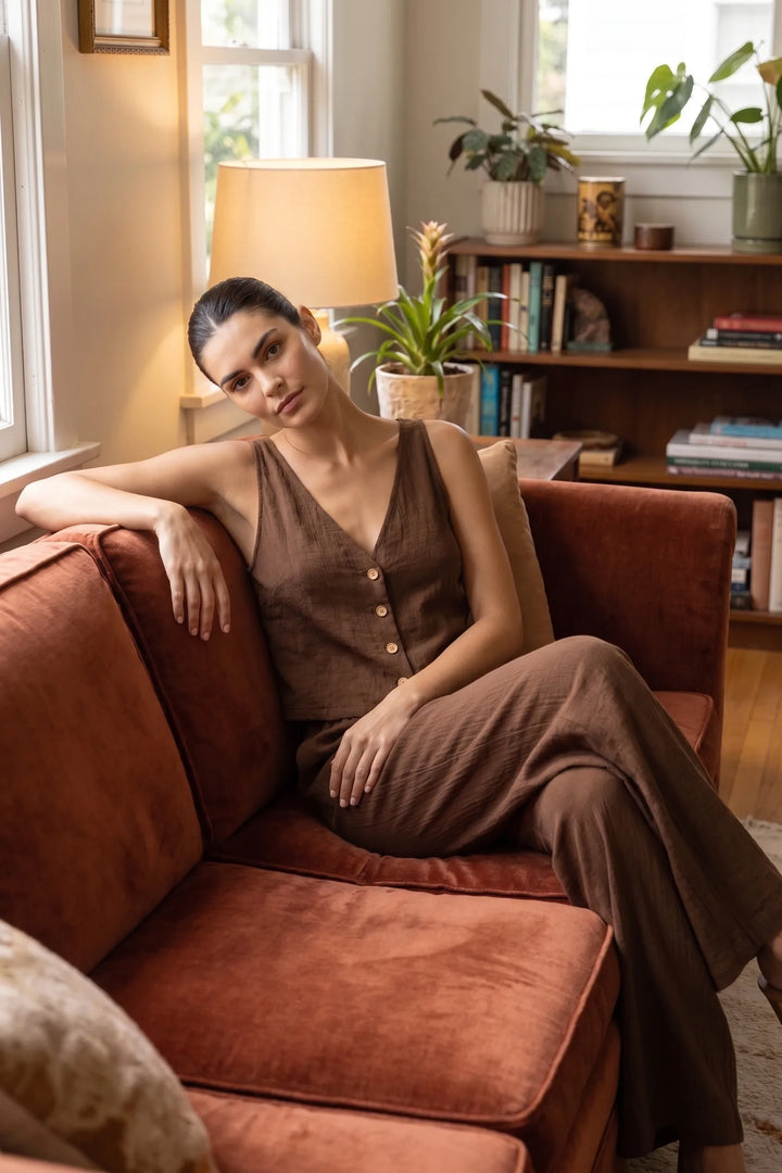 Brown button-front vest and wide-leg trousers set worn in a second lifestyle setting