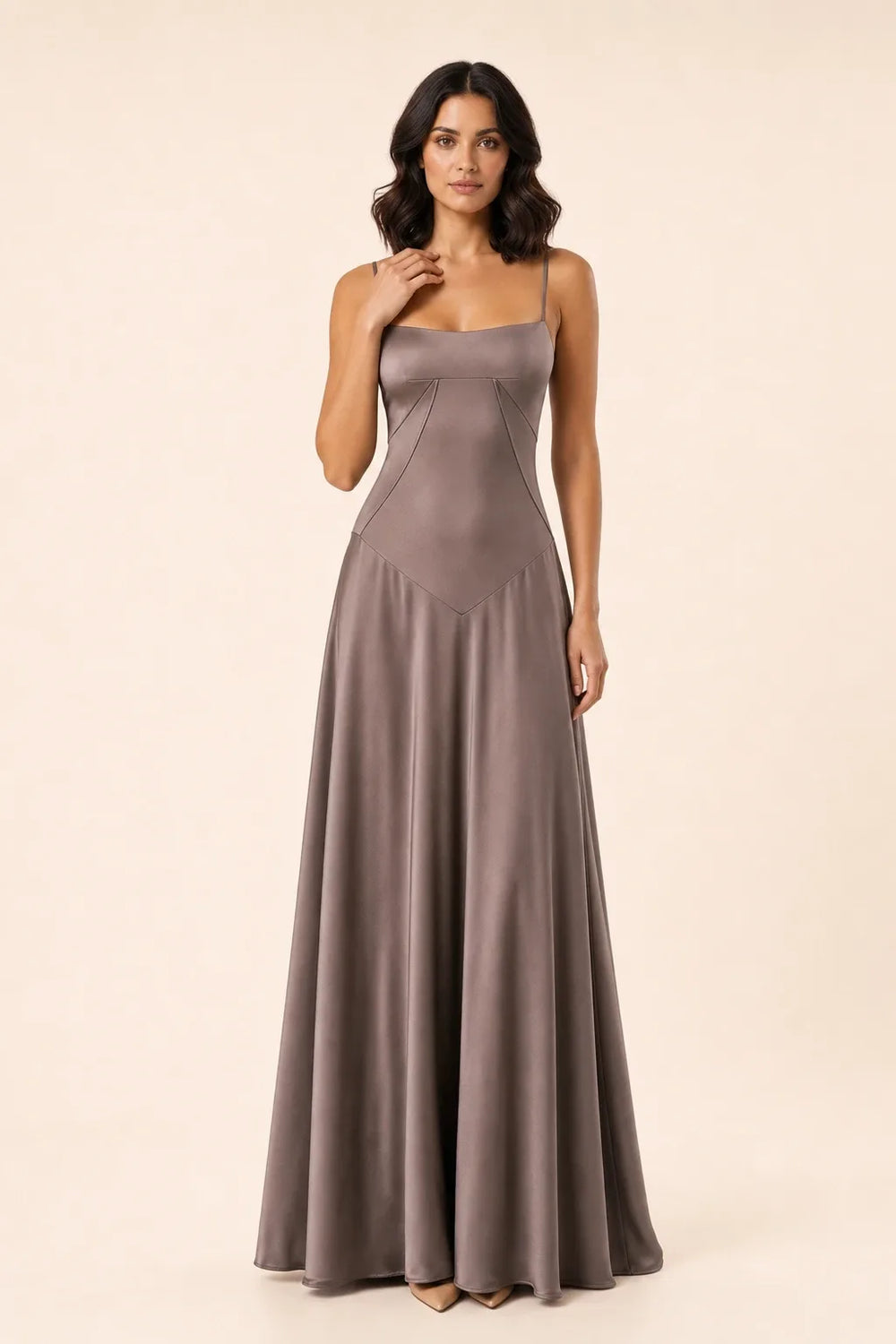 Smoke grey corset-seam maxi dress on a model in a contrapposto stance