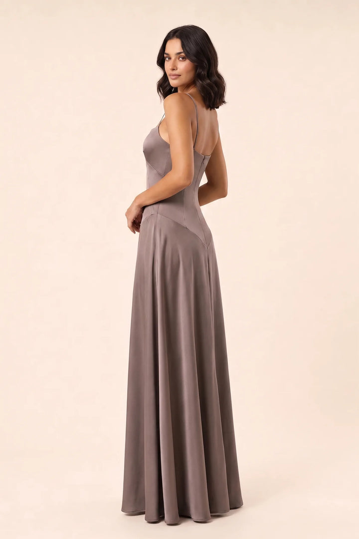 Smoke grey corset-seam maxi dress on a model in a three-quarter turn