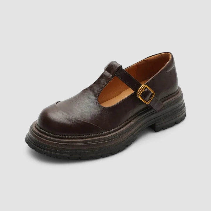 Brown platform T-bar Mary Jane shoe, heel view displaying block heel and sole thickness