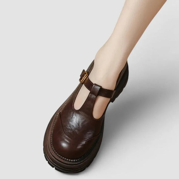 Brown platform T-bar Mary Jane shoe, sole view showing platform and tread detail