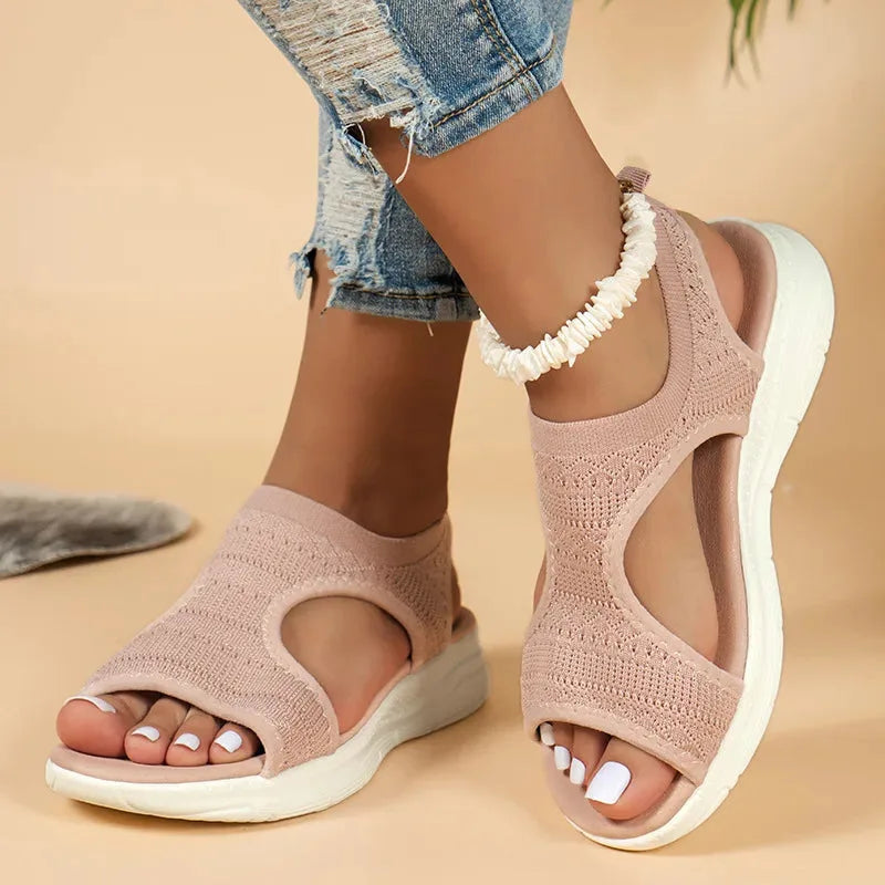 Black cutout platform sport sandal, side profile view