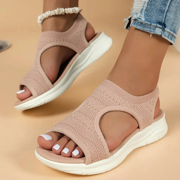 Pink cutout platform sport sandal, three-quarter view