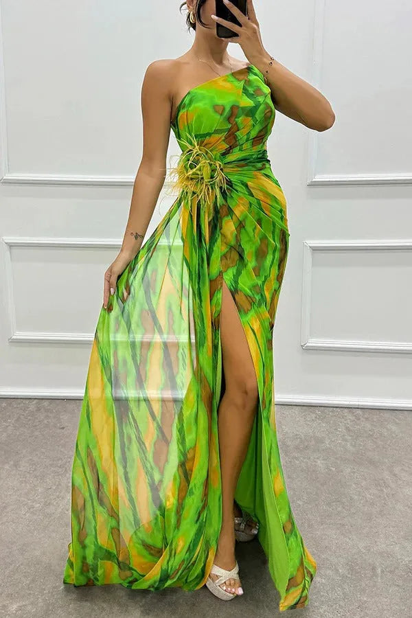 Model wearing a blue feather-trim maxi dress