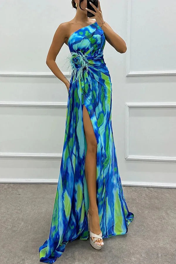 Model wearing a blue feather-trim maxi dress