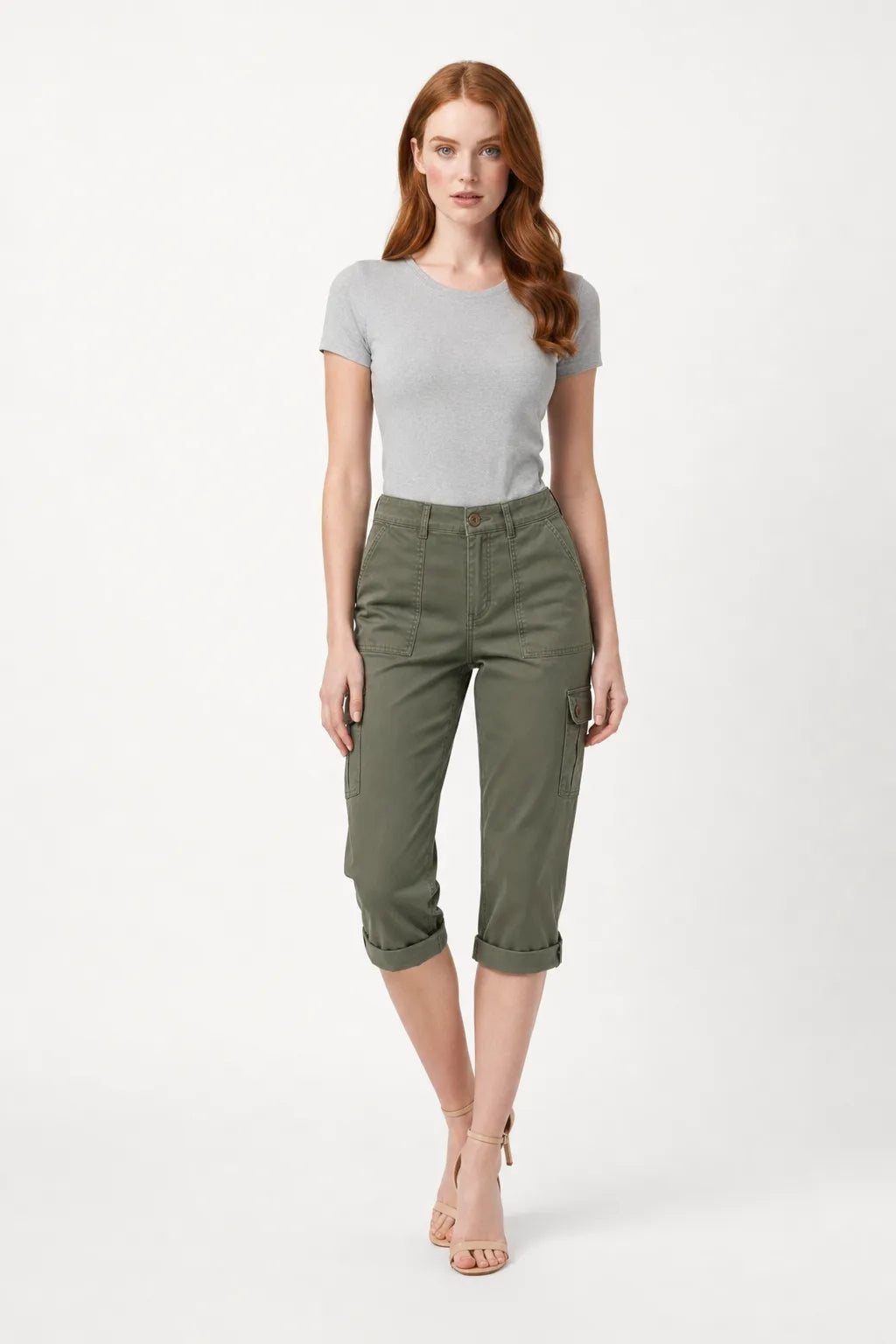 Army green cargo roll hem capri pants on model in contrapposto stance