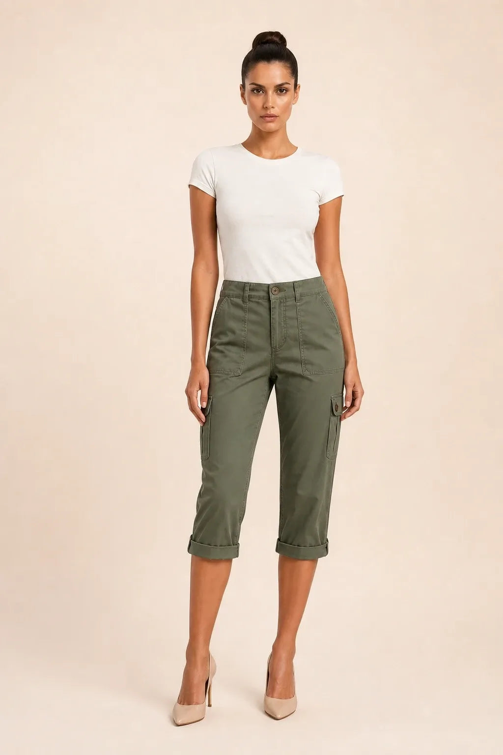 Army green cargo capri pants with roll hem on model in contrapposto stance