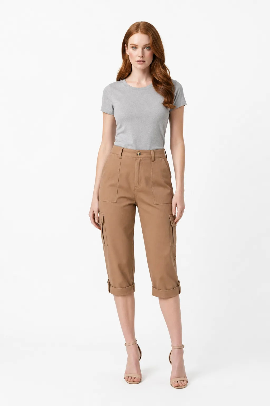 Coffee brown cargo roll hem capri pants on model in contrapposto stance