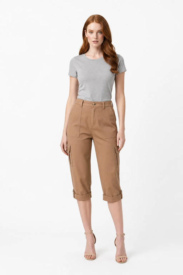 Coffee brown cargo roll hem capri pants on model in contrapposto stance